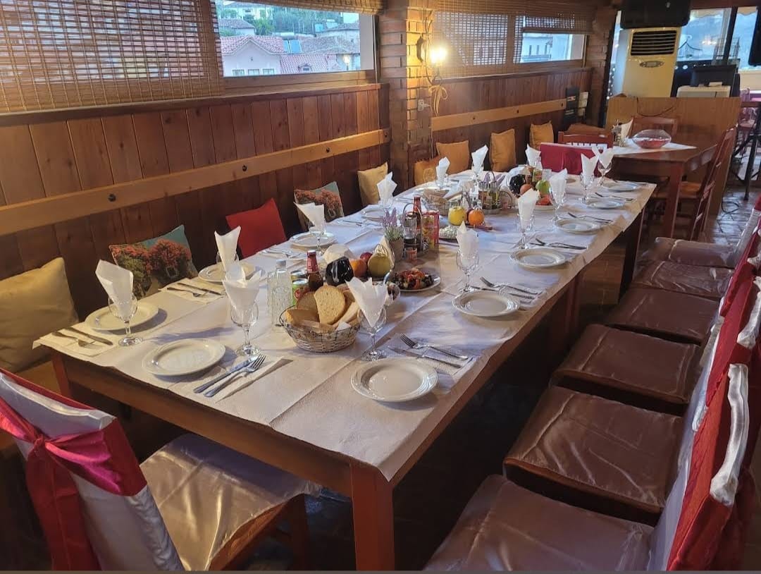 Long dining table set for guests